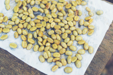 Red cherry coffee beans drying in the sunの写真素材