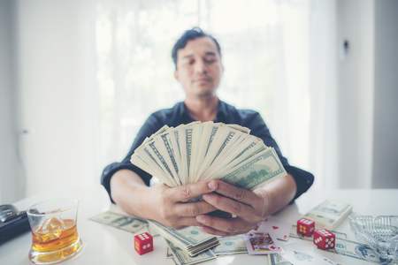 Man holding a lot of Money in hand , Business Success Concept.の写真素材