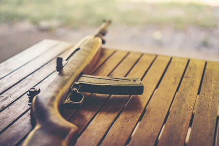 The ancient machine gun of the Second World War. the bullet of the gun looks at point blank range. Pointed soft short selective focus nozzle of the machine gunの写真素材