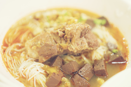 A beautiful set of local northern food of Thailand. with curry with crispy noodle on top. Eat with traditional side dishes.の写真素材