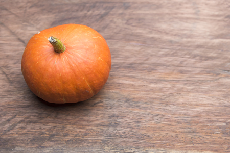 harvest of orange raw pumpkins harvest on table, top viewの写真素材