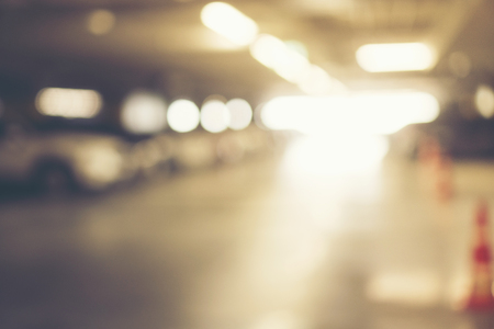 Abstract blur car parking lot for background, vintage filter imageの写真素材