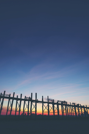 Last light at U Beng Bridge, wooden bridge in Mandalay, Myanmar.の写真素材