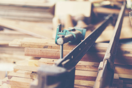 pine wood planks on wood table studio construction backgroundの写真素材