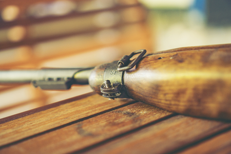 The ancient machine gun of the Second World War. the bullet of the gun looks at point blank range. Pointed soft short selective focus nozzle of the machine gunの写真素材