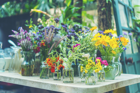 colorful flower on outdoor coffee tableの写真素材