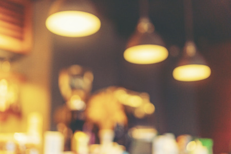 Blurred background made with Vintage Tones,Coffee shop blur background with bokehの写真素材