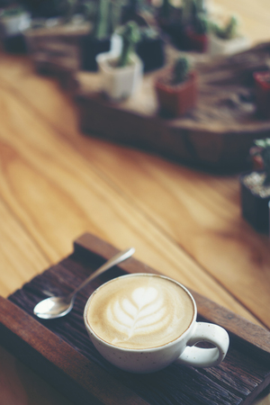 Cup of coffee latte in coffee shopの写真素材