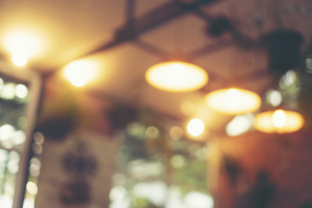 Blurred background in coffee cafe, vintage filter imageの写真素材
