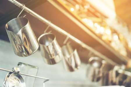 Accessories and items for coffee bar on cafe background. Equipment for cafes, vintage filter imageの写真素材