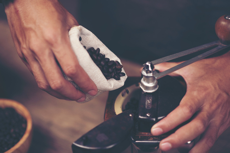 Making brewed coffee from steaming filter drip style.の写真素材