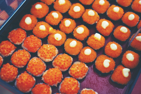Japanese sushi arranged in a serving tray of a Japanese restaurant.の写真素材