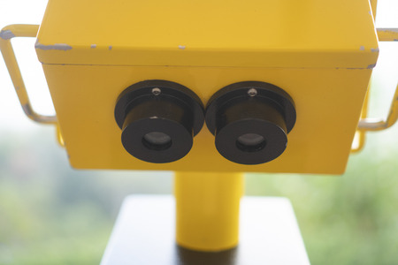 Sightseeing Binoculars Overlooking top view of Georgetown, Penang Island, Malaysiaの写真素材