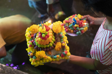 Bangkok, Thailand - November 22 2018 : Loy Krathong festival, People buy flowers and candle to light and float on water to celebrate the Loy Krathong festival in Thailand.のeditorial素材