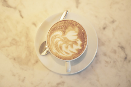 coffee latte art, vintage filter imageの写真素材