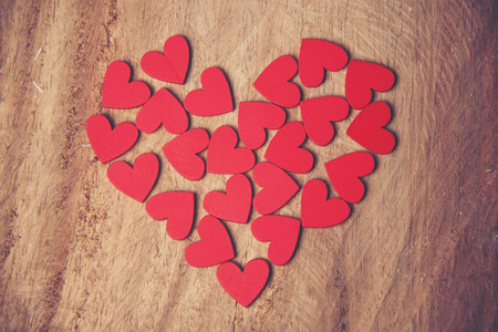 The red Heart shapes on abstract background in love concept for valentines day with sweet and...
