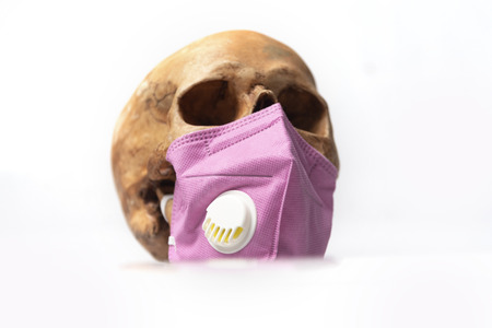 air pollution concept , pm 2.5 warning, human skull