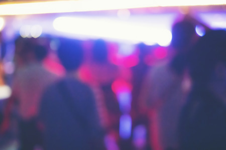 abstract blurry background, Drinkers are dancing in a pub party.