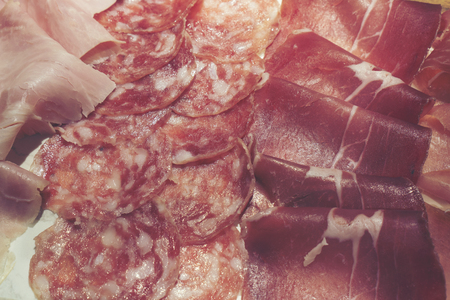 Chunks of salted lard background, spices and herbs, Homemade glazed smoked ham and jerky meat with fresh natural herbs and aromatic spicesの写真素材
