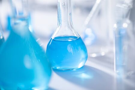 Chemical laboratory equipment Glassware for research and blue matter