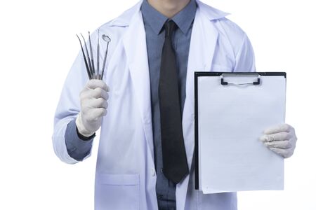 Dentist and dental work tools, isolated on whiteの写真素材
