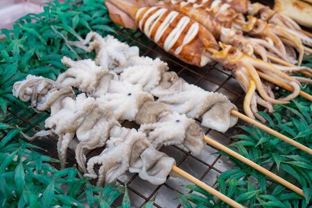 local BBQ grilled squid, Thai street foodの写真素材