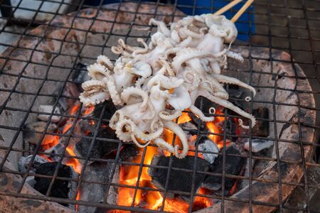 local BBQ grilled squid, Thai street foodの写真素材