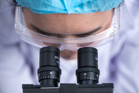 Doctors are diagnosed in the laboratory. With microscopyの写真素材