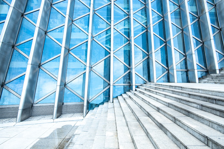 Shenzhen, China - August, 2019: background of modern building, wall reflection with blue skyのeditorial素材