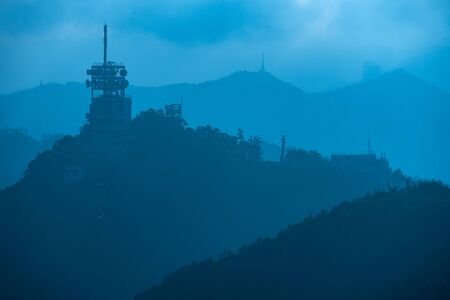 Internet and satellite towers on the mountainsの写真素材