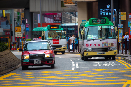 Hong Kong, China - August, 2019 : Taxi and traffic in Hong Kong, Chinaのeditorial素材
