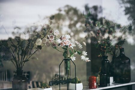 Flowers that are decorated in the coffee cafeの写真素材