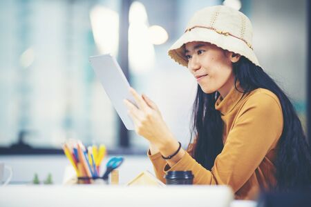 creative worker women using tablet, freelance conceptの写真素材