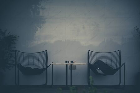 Cozy design chair and table in the garden; natural feelingの写真素材