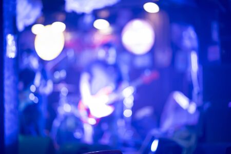 abstract blurry of musical playing guitar in pubの写真素材