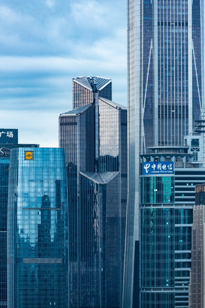 background of modern building, wall reflection with blue skyのeditorial素材