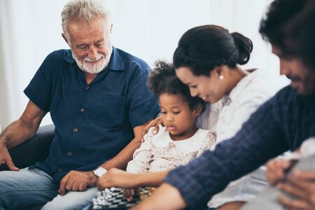 The picture of the relationship between mother, child and family.の写真素材