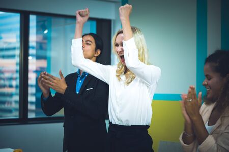 The young business team is happening the success of the business  business success conceptの写真素材