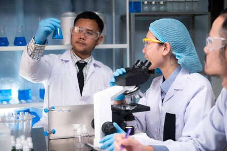 Scientific researchers team are working in the laboratoryの写真素材