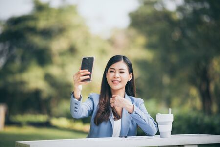 A business woman with a desk in the morningの写真素材