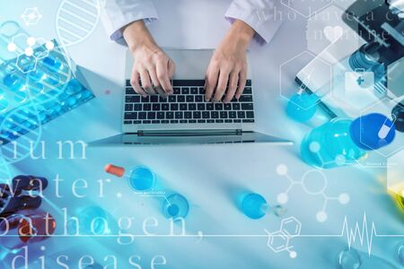 scientists working with laboratory tools on desk, Science and research graphic imagesの写真素材