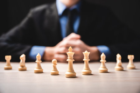 idea of winner, business leadership and successful concept with chess pieces and businessman handの写真素材
