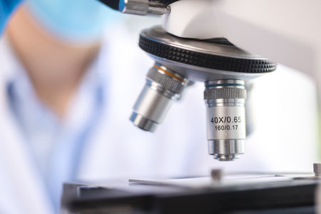 Health care researchers working in life science laboratory, medical science technology research work for test a vaccine, coronavirus covid-19 vaccine protection cure treatmentの写真素材