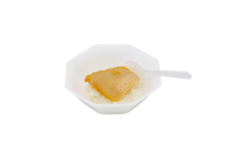 Steamed custard on sticky rice isolated on white backgroundの写真素材
