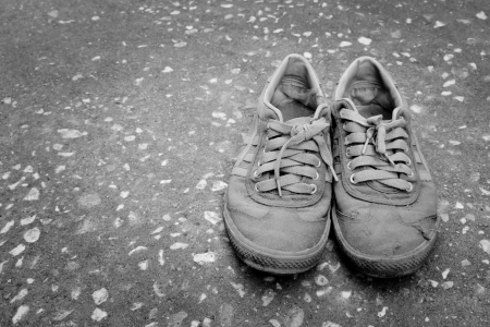 Dirty old sport shoe - Black   Whiteの写真素材
