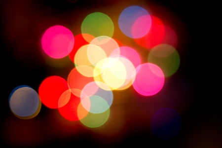 Defocused bokeh image of colorful christmas fairy lightsの写真素材
