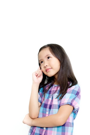 A dreaming beautiful little girlの写真素材