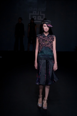Bangkok - April 17  A Model walks the runway at Divulge   The final collection of the graduates show from the Fashion Department of Decorative Arts, Silpakorn University on Apirl 17,2013 in Bangkokのeditorial素材