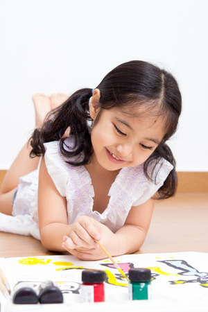 Little Asian artist child drawing and painting の写真素材