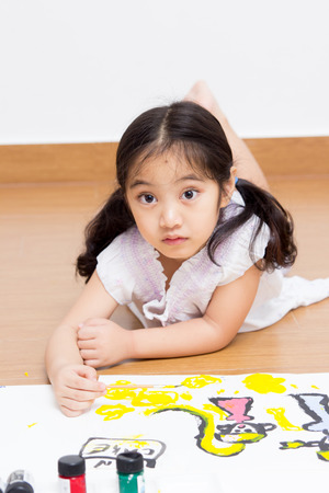 Little Asian artist child drawing and painting の写真素材